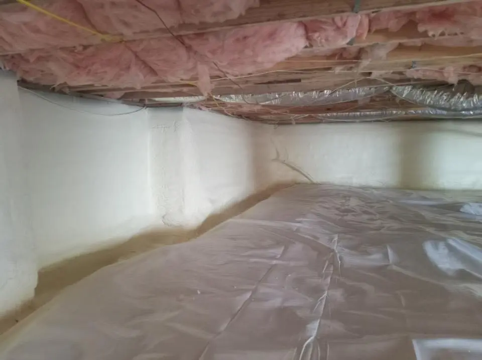 Crawl space encapsulation with closed-cell spray foam for Commercial Roof Restoration in Sheboygan Falls